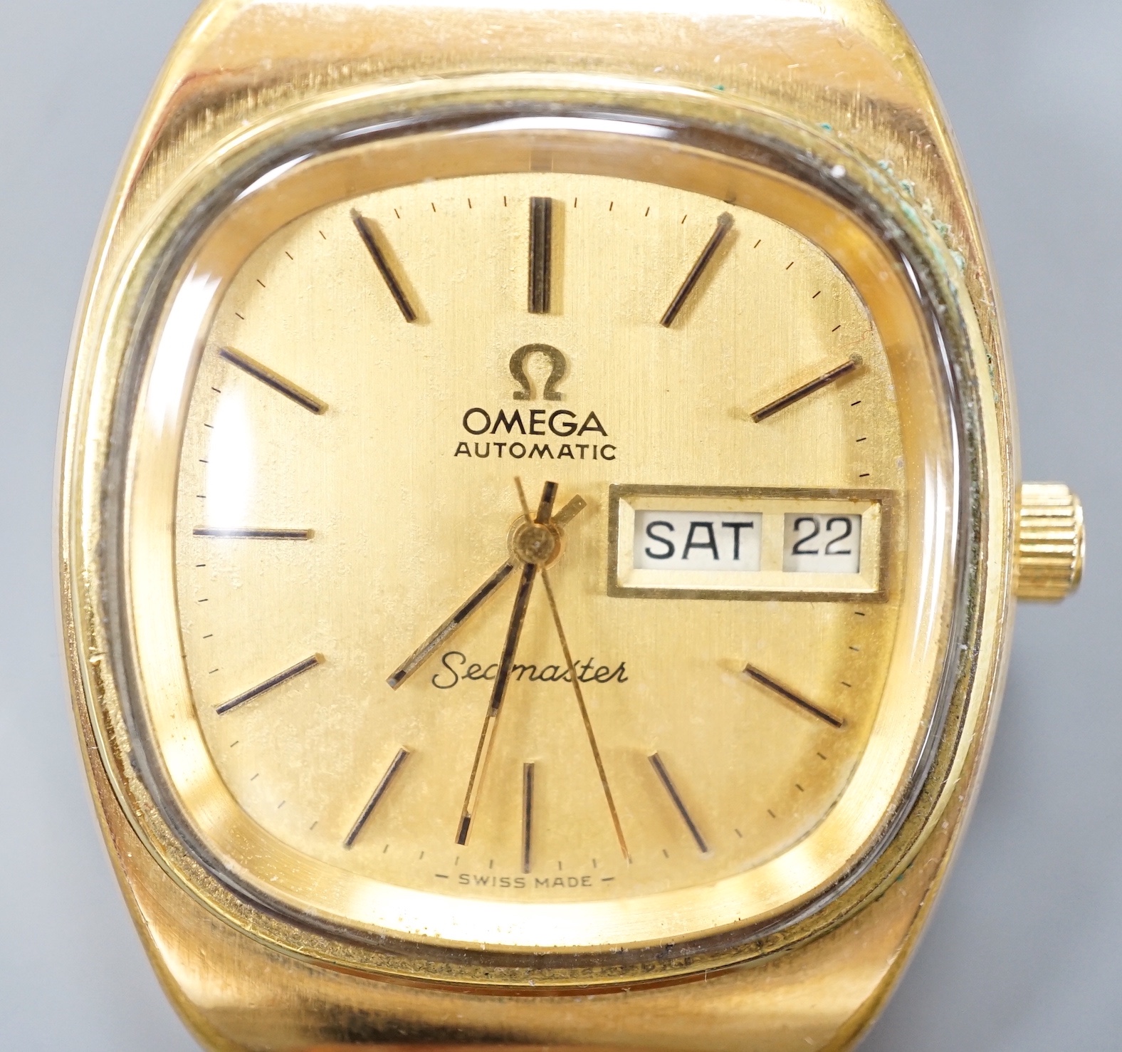 A gentleman's gold plated Omega Seamaster Automatic wrist watch, on Omega brown leather strap, with Omega buckle, case diameter 35mm, no box or papers.